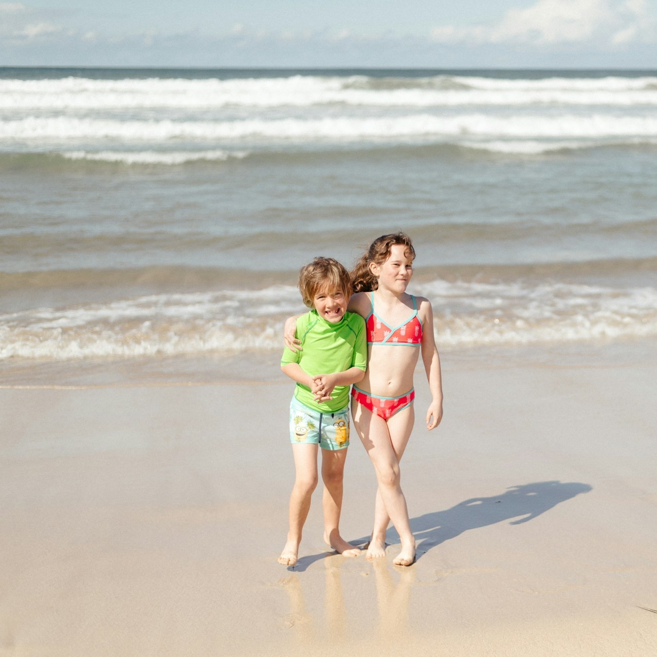 boy-and-girl-enjoying-on-beach